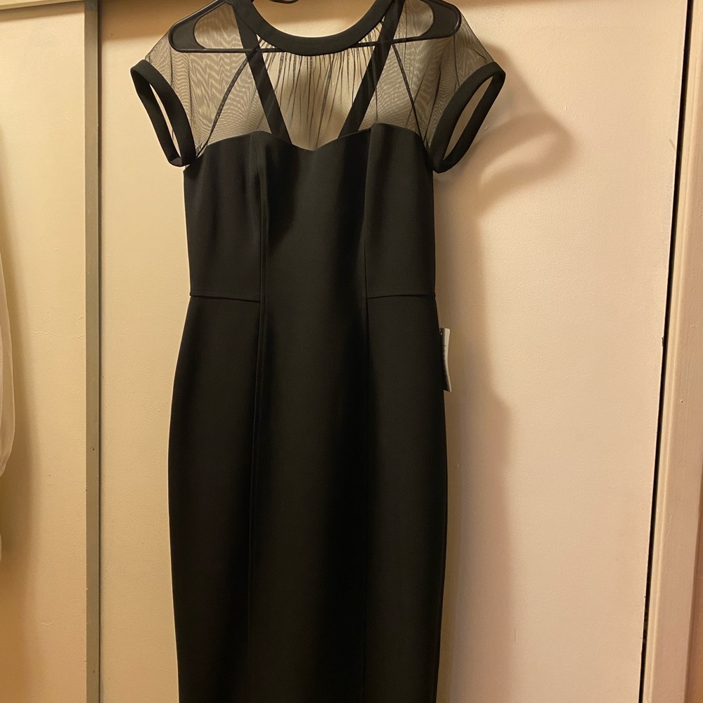 Cute little black dress made by Maggy London size 10